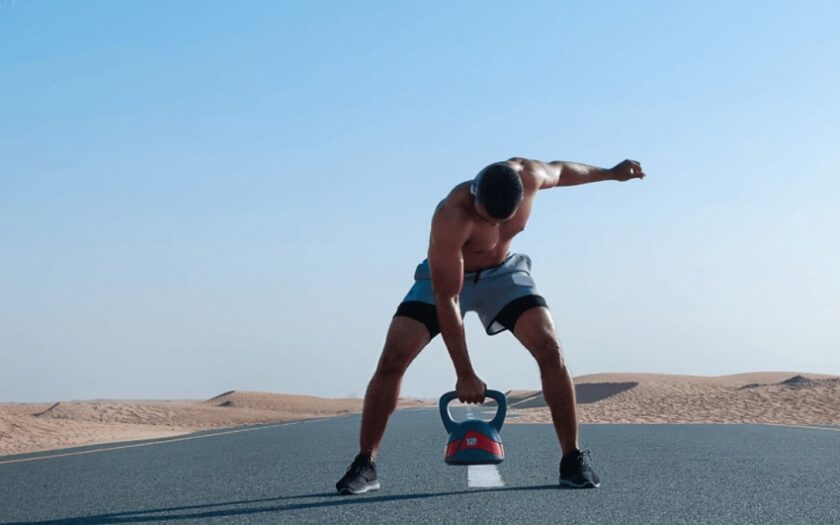 man with kettle bell