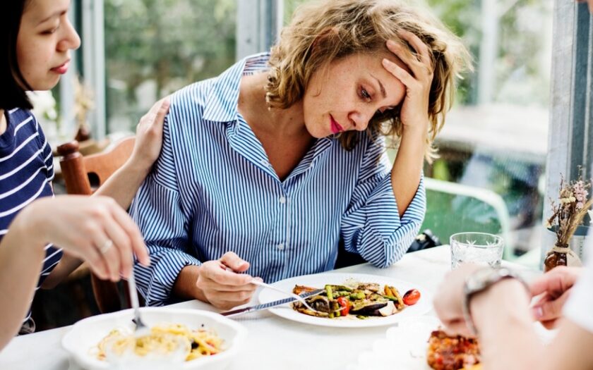 a nervous lady eating